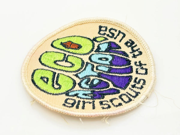 The patch was designed to symbolize the Girl Scouts' commitment to ecology and environmental conservation. Girls could earn the badge by participating in activities related to conservation, recycling, nature education, and taking action on local environmental issues. The "Eco Action" badge is now a retired patch and is considered a collectible item.