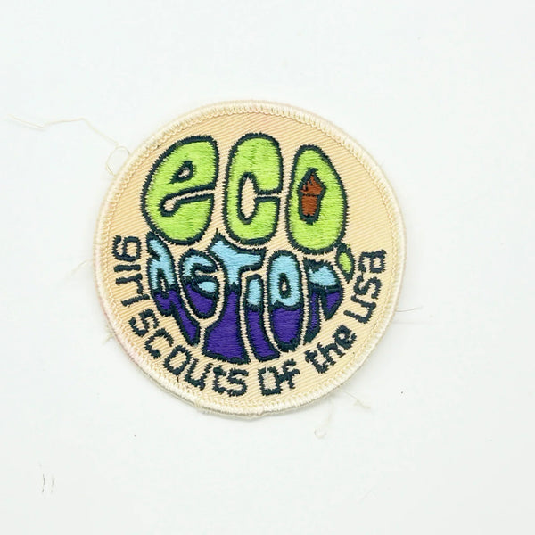 The patch was designed to symbolize the Girl Scouts' commitment to ecology and environmental conservation. Girls could earn the badge by participating in activities related to conservation, recycling, nature education, and taking action on local environmental issues. The "Eco Action" badge is now a retired patch and is considered a collectible item.