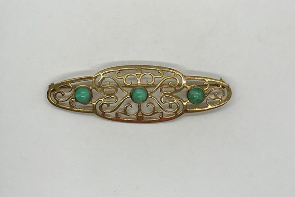 Elegant 1920s Art Deco Brooch with Green Stones - Lamoree’s Vintage