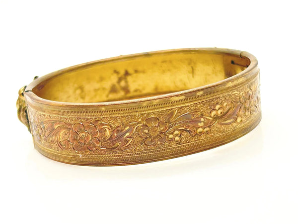 Discover our stunning Floral Bangle. This vintage-inspired, decorative gold bracelet adds an elegant touch to any outfit. Shop Lamoree’s Vintage now!