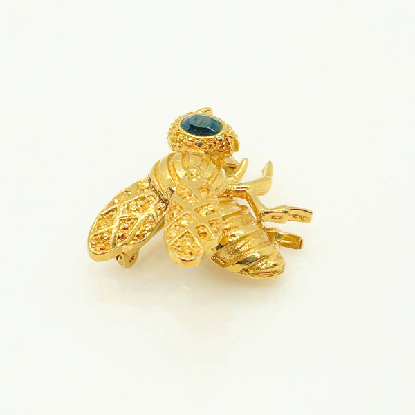 This Gerry's vintage golden bee brooch boasts exquisite detailing, ensuring a 1 1/2" inch wide diameter that presents in mint condition.