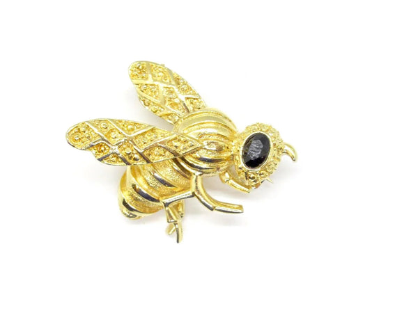 This Gerry's vintage golden bee brooch boasts exquisite detailing, ensuring a 1 1/2" inch wide diameter that presents in mint condition.