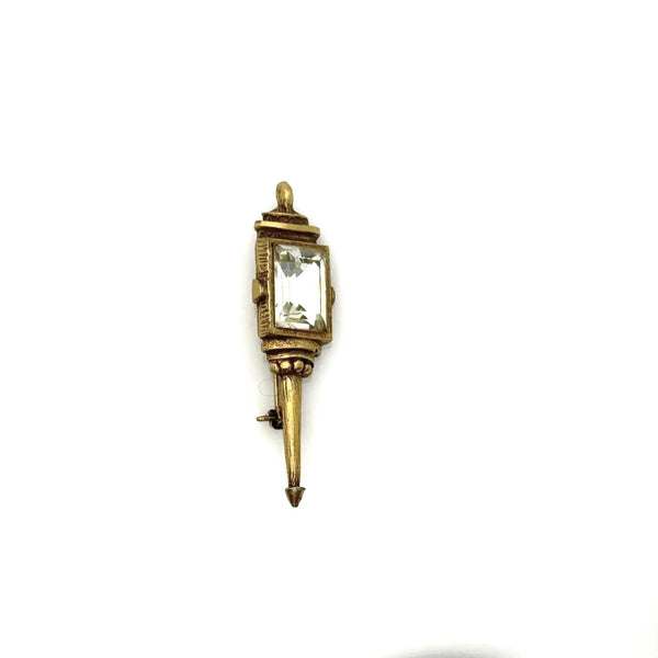 Signed Goldette vintage Victorian Revival gold-tone lantern brooch pin with an emerald-cut clear glass rhinestone