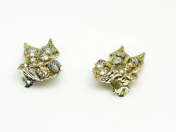 Golden Sparkling Stones Knot Earrings - Make a dazzling statement with radiant aurora borealis stones. Featuring a secure hinge back for comfortable wear. Shop now!