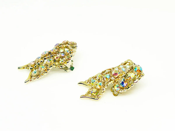 Golden Sparkling Stones Knot Earrings - Make a dazzling statement with radiant aurora borealis stones. Featuring a secure hinge back for comfortable wear. Shop now!