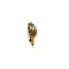 Signed Goldette vintage Victorian Revival gold-tone lantern brooch pin with an emerald-cut clear glass rhinestone