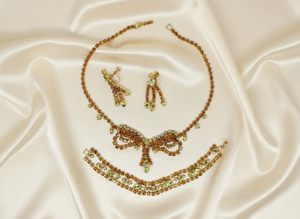 Perfect for discerning collectors: our Vintage Golden Rhinestone Parure provides timeless elegance with bright stones that captivate. Shop today!