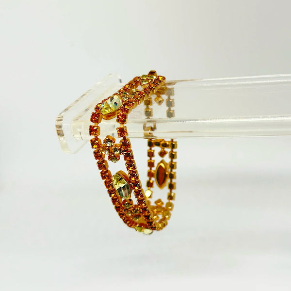 Perfect for discerning collectors: our Vintage Golden Rhinestone Parure provides timeless elegance with bright stones that captivate. Shop today!