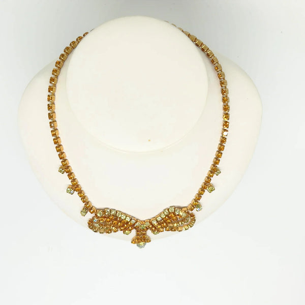 Perfect for discerning collectors: our Vintage Golden Rhinestone Parure provides timeless elegance with bright stones that captivate. Shop today!