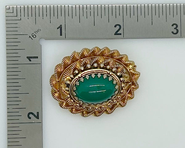 Vintage Green Oval Cabochon Brooch with Textured Setting