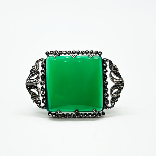 Perfect for vintage jewelry lovers: our Green Square Stone pin provides timeless elegance with a marcasite-studded vintage brooch design. Shop today!