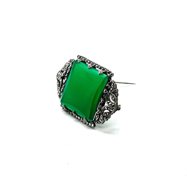 Perfect for vintage jewelry lovers: our Green Square Stone pin provides timeless elegance with a marcasite-studded vintage brooch design. Shop today!