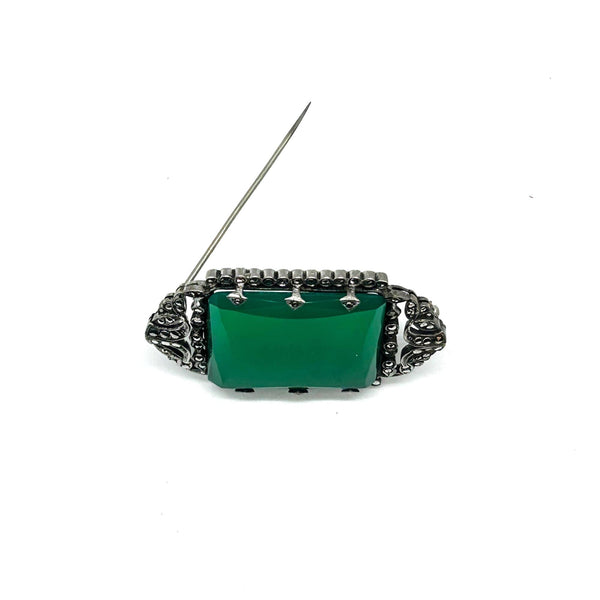 Perfect for vintage jewelry lovers: our Green Square Stone pin provides timeless elegance with a marcasite-studded vintage brooch design. Shop today!