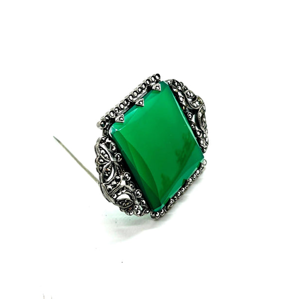 Perfect for vintage jewelry lovers: our Green Square Stone pin provides timeless elegance with a marcasite-studded vintage brooch design. Shop today!