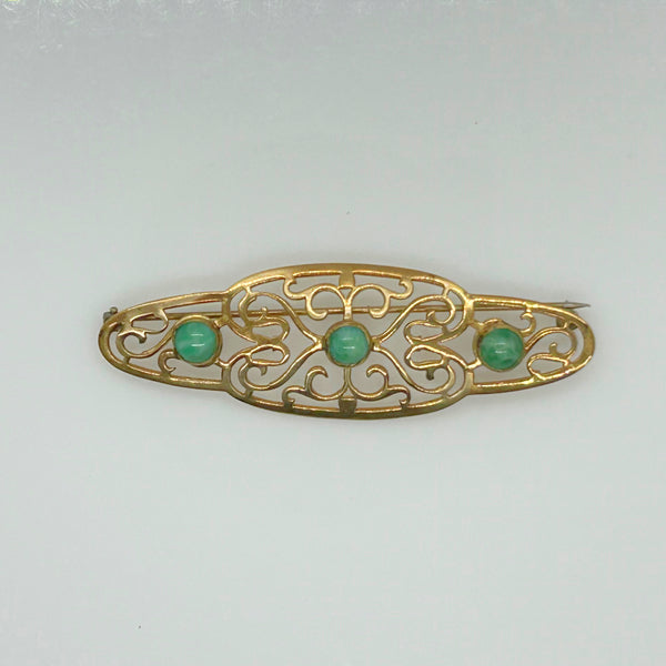 Elegant 1920s Art Deco Brooch with Green Stones