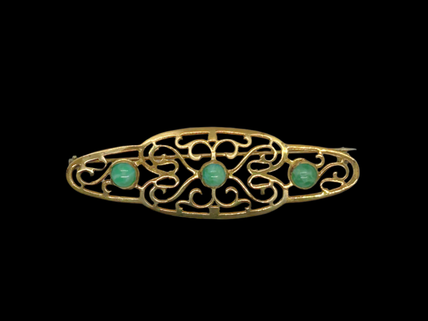 Elegant 1920s Art Deco Brooch with Green Stones