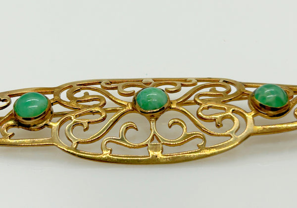 Elegant 1920s Art Deco Brooch with Green Stones