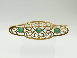 Elegant 1920s Art Deco Brooch with Green Stones