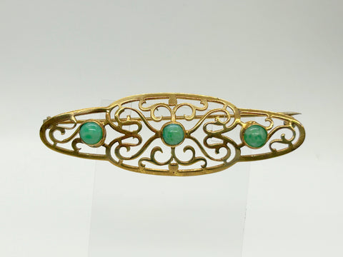 Elegant 1920s Art Deco Brooch with Green Stones