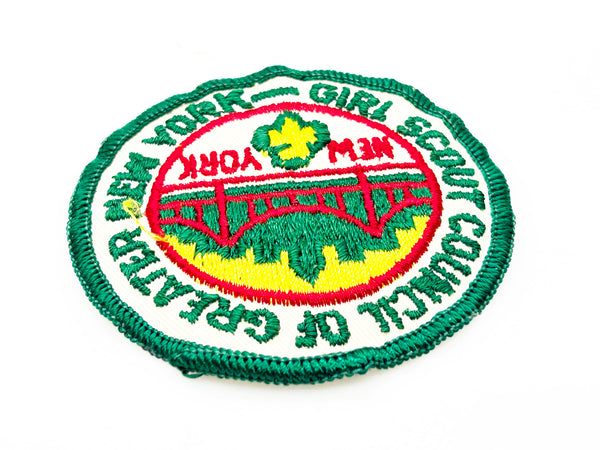 Embroidered patch with 'Girl Scout Council of Greater New York' logo on a white background