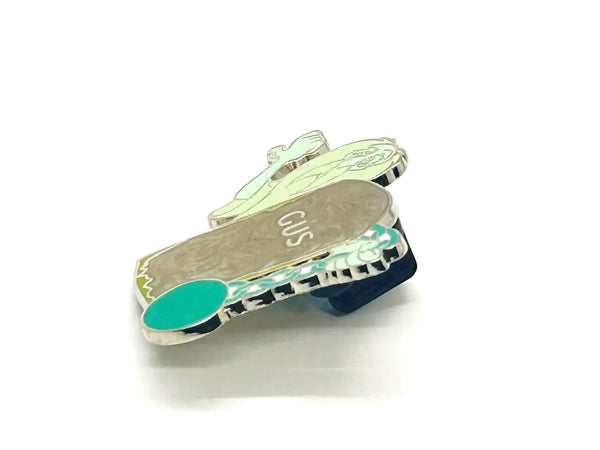 This delightful enamel pin captures one of Disney's most beloved characters from the classic Haunted Mansion! It is an Open Edition pin from the Magic Kingdom's Haunted Mansion Interactive Graveyard Mystery Collection. 