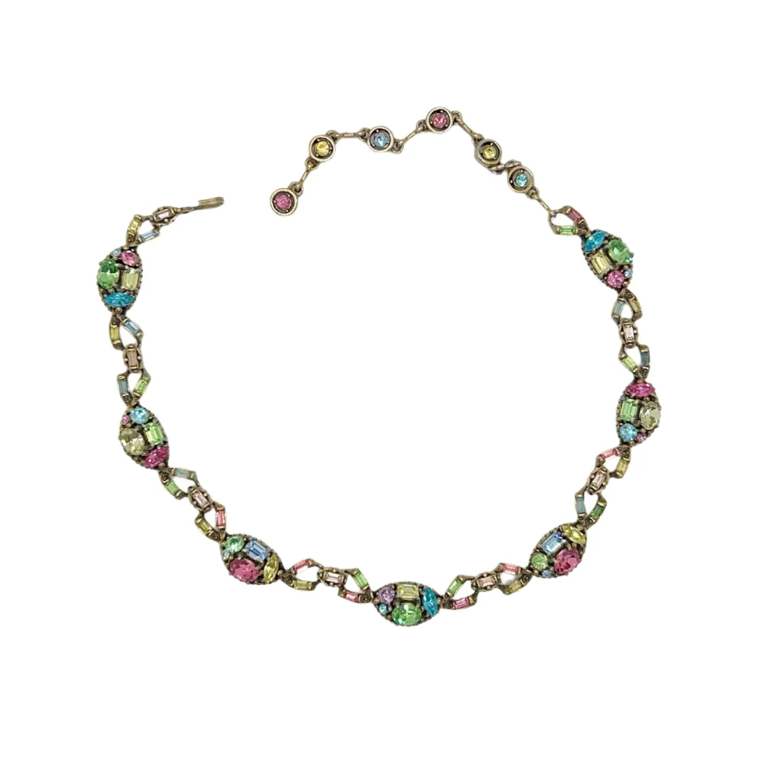 A stunning array of colors and shapes, carefully crafted into a one-of-a-kind piece. With a 4" extender for the perfect fit, this choker is sure to make a statement and add a touch of elegance to any outfit. Don't miss out on this unique and versatile addition to your jewelry collection!