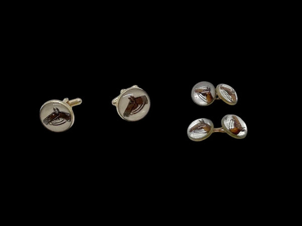 Indulge in timeless sophistication with these exquisite vintage cufflinks featuring an elegant horse design. The larger, 3/4" toggle type pair showcases a majestic brown horse with reins, while the smaller, 1/4" close end bridge style pair adds a touch of opulence with its gold tone metal.