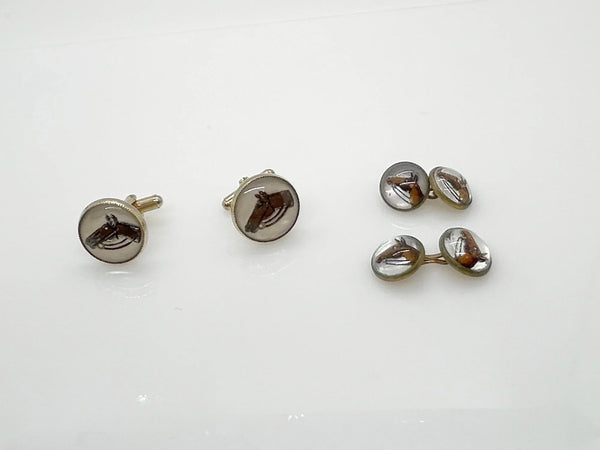 Indulge in timeless sophistication with these exquisite vintage cufflinks featuring an elegant horse design. The larger, 3/4" toggle type pair showcases a majestic brown horse with reins, while the smaller, 1/4" close end bridge style pair adds a touch of opulence with its gold tone metal.