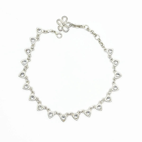 This charming necklace features heart shapes with sparkling round rhinestones at the center. Flip it over to reveal solid hearts with a sleek brushed finish—wear it whichever way suits your mood! Measuring 16" long, it’s secured with an adjustable whimsical flower clasp and a trusty lobster closure for a fun, flirty touch.