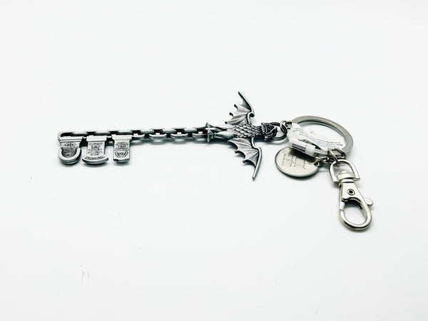 Perfect for Disney fans: our Disney Haunted Mansion Bat Key Chain provides a collectible, durable, bat wing design with iconic logo. Shop today!