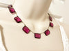 Admire the timeless beauty of our Graceful Vintage Czech Violet Clear Stones Necklace. Handcrafted with thirteen emerald cut purple clear stones encased in intricately detailed frames, this elegant necklace is a true work of art. With a length of approximately 15", it is a delicate and sophisticated addition to any outfit. Experience luxury and exclusivity with this exquisite piece, in very good vintage condition. Free Shipping