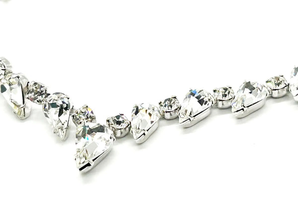 Discover the magic of this stunning vintage Superb Kramer Rhinestone Necklace, where icy brilliance meets timeless elegance.