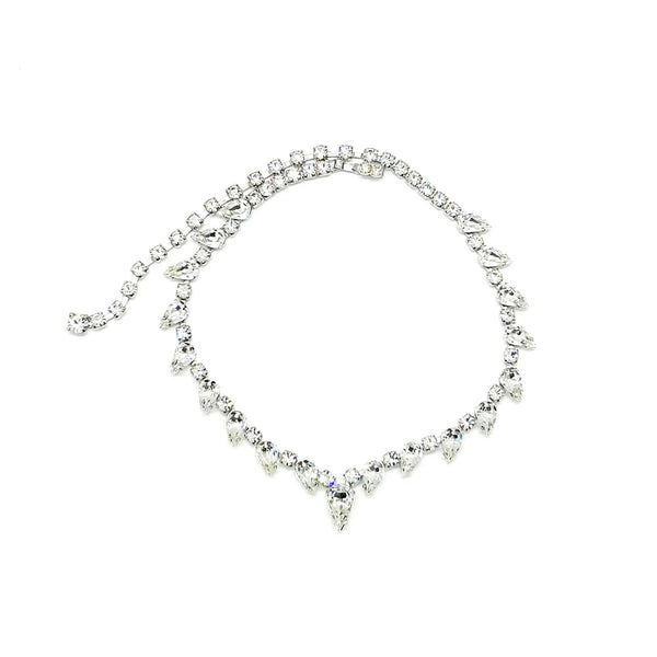 Discover the magic of this stunning vintage Superb Kramer Rhinestone Necklace, where icy brilliance meets timeless elegance. 