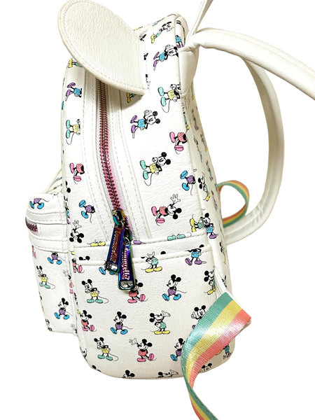  Enjoy the exclusive, pastel rainbow charm of our Loungefly Disney Pastel Rainbow Mickey Mouse Mini Backpack. Adjustable straps add comfort. Very hard to find