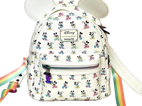  Enjoy the exclusive, pastel rainbow charm of our Loungefly Disney Pastel Rainbow Mickey Mouse Mini Backpack. Adjustable straps add comfort. Very hard to find