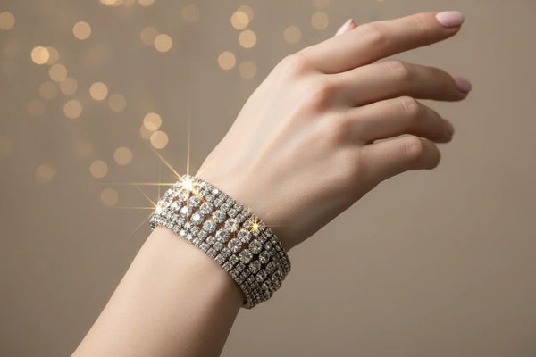 Make your statement with this dazzling vintage rhinestone bracelet! This stunning piece measures approximately 7 inches in length and 1.25 inches in height, ensuring a stunning presence on your wrist.