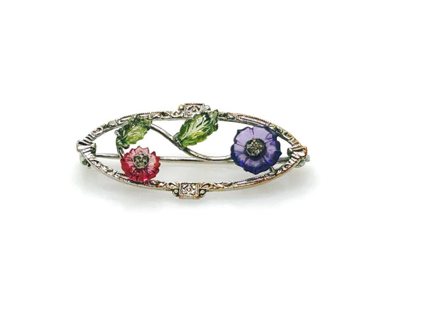 Delicate purple and red flowers adorned with multicolor guilloche enamel catch the light, marcasite stones (iron pyrite) sparkle like diamonds. 