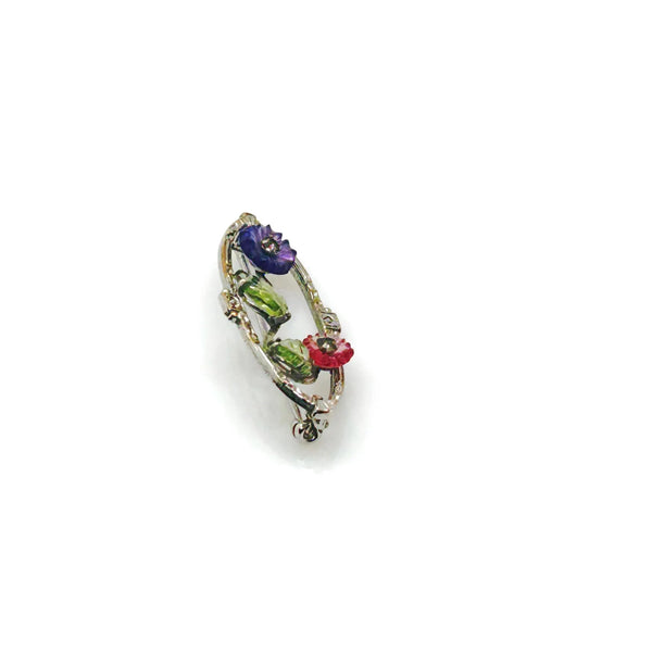 Perfect for vintage jewelry lovers: our Antique Springtime Floral Brooch provides early 20th century elegance with colorful blooms and sparkling marcasite. Shop today!