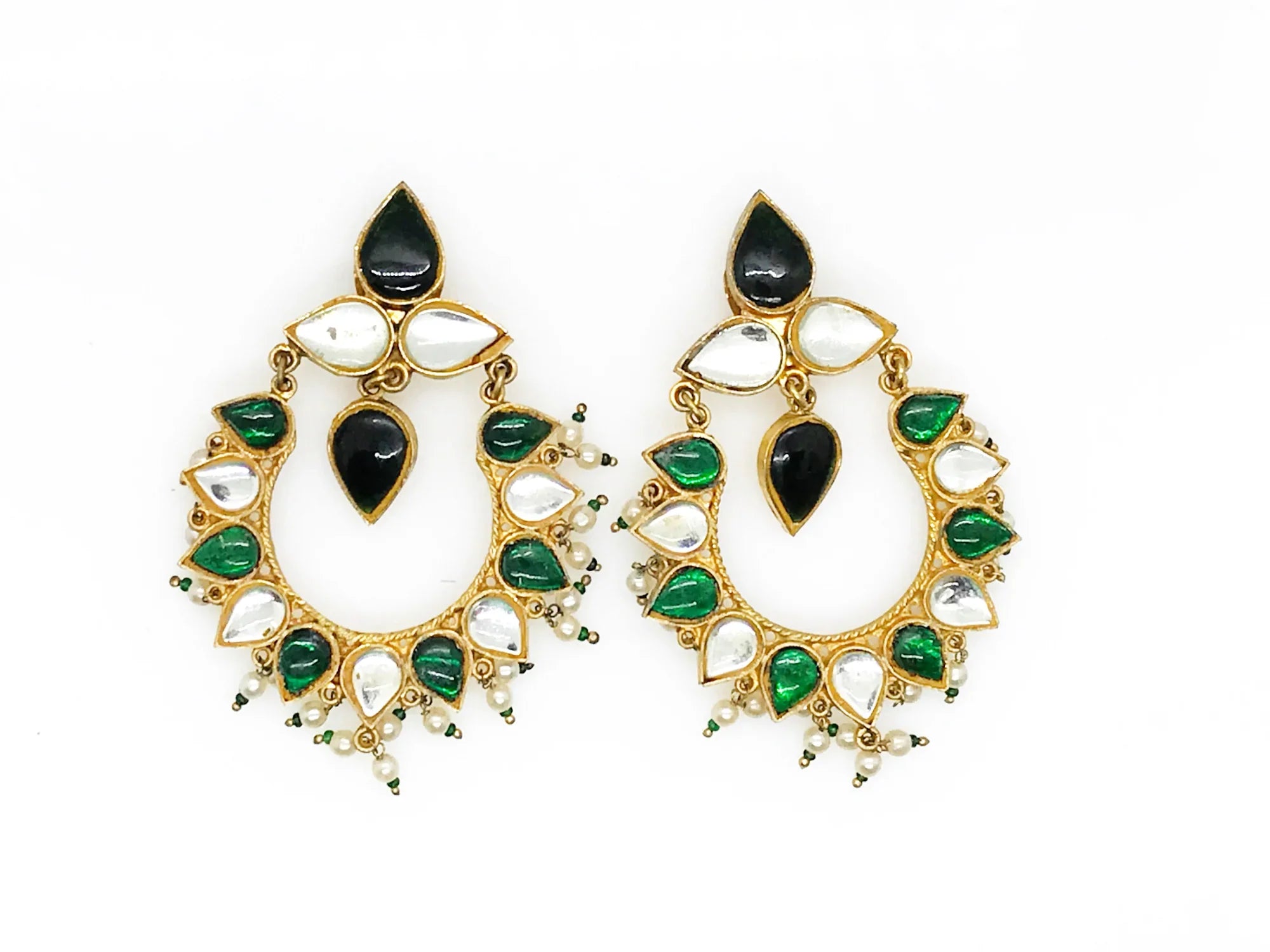Get ready to make a statement with a pair of stunning earrings that effortlessly combine legance of Moghul style and boldness. Each clip on earring features an alternating pattern of dramatic pear-shaped green and clear stones, along with a striking green drop that is beautifully accented with faux pearl and green beads. 