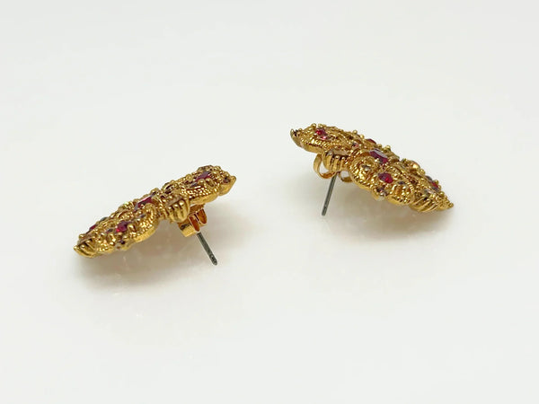 These filigreed vintage red earrings offer an exquisite aesthetic, beautifully detailed with pink, purple, and red chaton rhinestones in a square pattern. Meticulously designed, each earring's dimensions measure 3/4" square. 