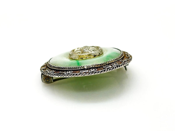 The shades of this vintage Chinese sterling silver and jade filigree brooch are perfect for spring and summer.