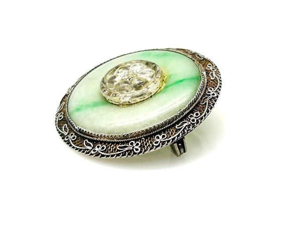 The shades of this vintage Chinese sterling silver and jade filigree brooch are perfect for spring and summer.