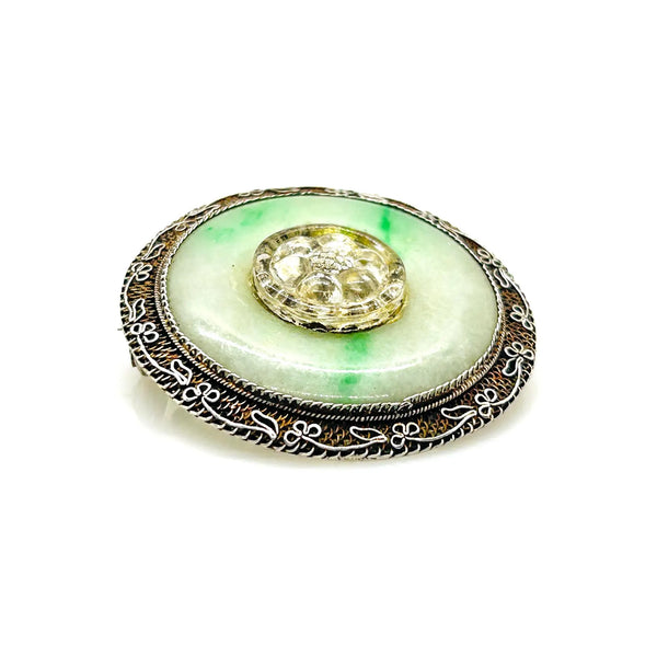The shades of this vintage Chinese sterling silver and jade filigree brooch are perfect for spring and summer.
