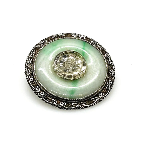The shades of this vintage Chinese sterling silver and jade filigree brooch are perfect for spring and summer.