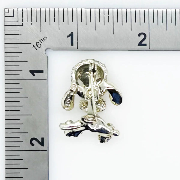 Stand out from the crowd with this adorable Vintage Tiny Gerry's Poodle Brooch with Big Eyes! Its textured gold tone metal and lifelike details make it a unique and charming addition to any outfit.
