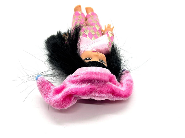 Jester Jenny doll wearing a pink and white checkered outfit with a matching hat on a white background