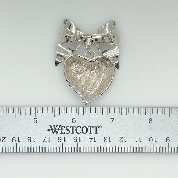 KJL Silver Tone Puffed Heart and Bow Brooch