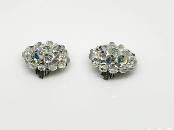 These vintage earrings are so bright and sparkling that it's hard to capture. They retain all of the colorful reflections of light despite the passage of time. There are three layers of hand wired round bead, and from every angle, there is sparkle.