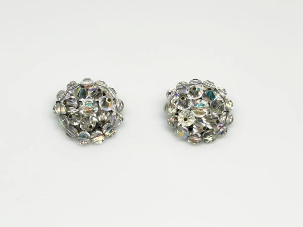 These vintage earrings are so bright and sparkling that it's hard to capture. They retain all of the colorful reflections of light despite the passage of time. There are three layers of hand wired round bead, and from every angle, there is sparkle.