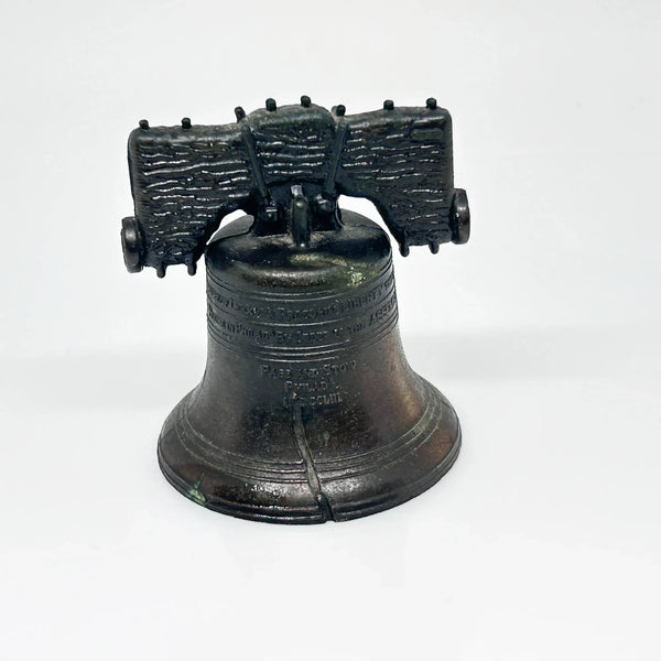 Bring a touch of American history to your home with this charming, miniature metal replica of the iconic Liberty Bell. Standing at a delightful 2.5 inches tall, this piece beautifully captures the essence of freedom and independence, a symbol that has resonated since the American Revolution.
